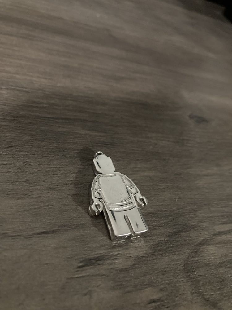 Silver Toy Hockey Player Necklace